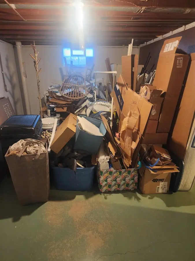 Roll-off dumpster container at job site for 8 Yard Dumpster Rental in Two Harbors